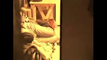 Play Peeking at my mom as she masturbates under her pants